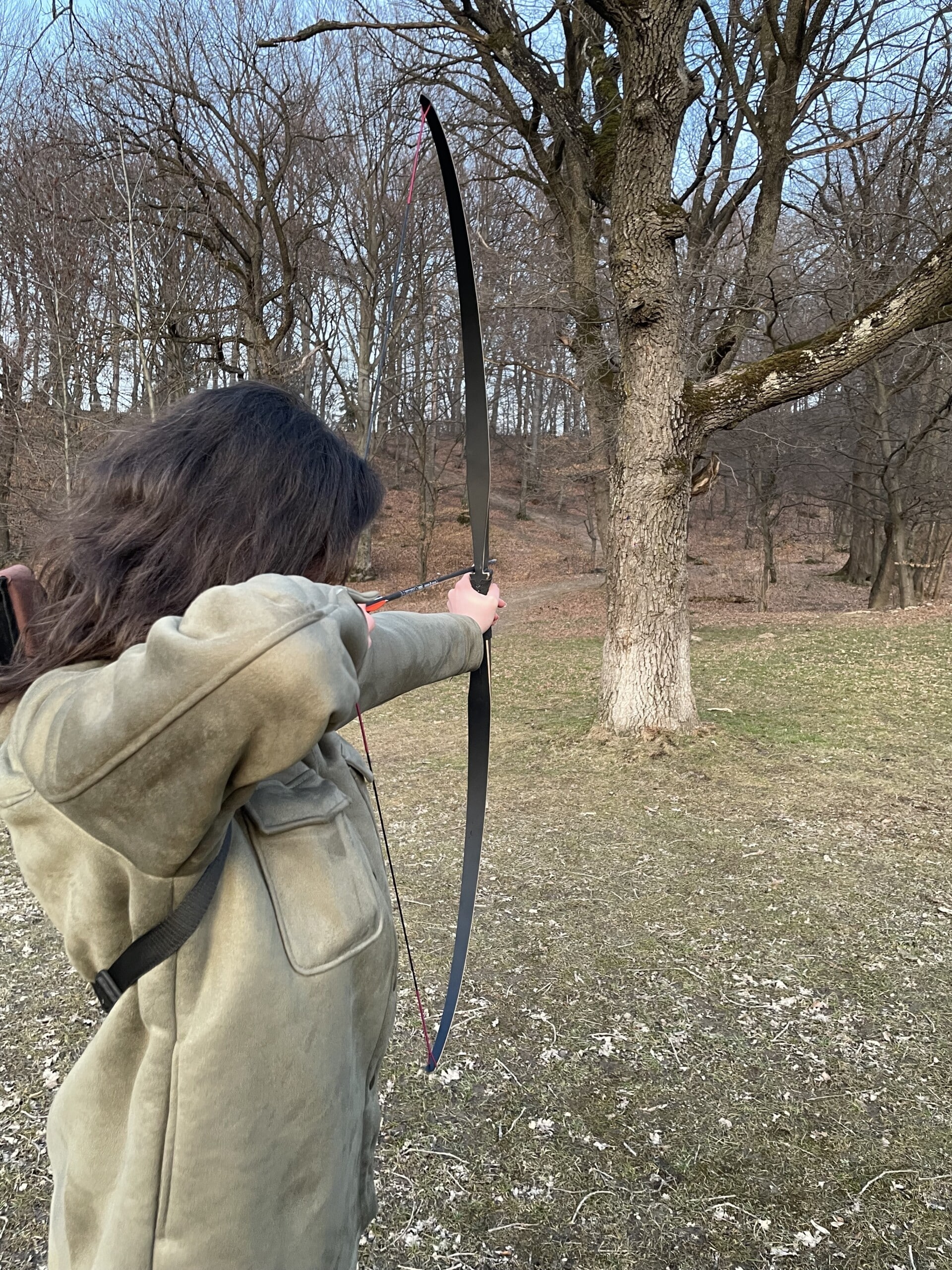 Andy is doing archery